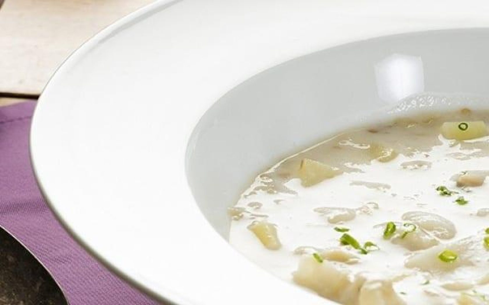 Cream of eggplant soup with cod and light coconut milk