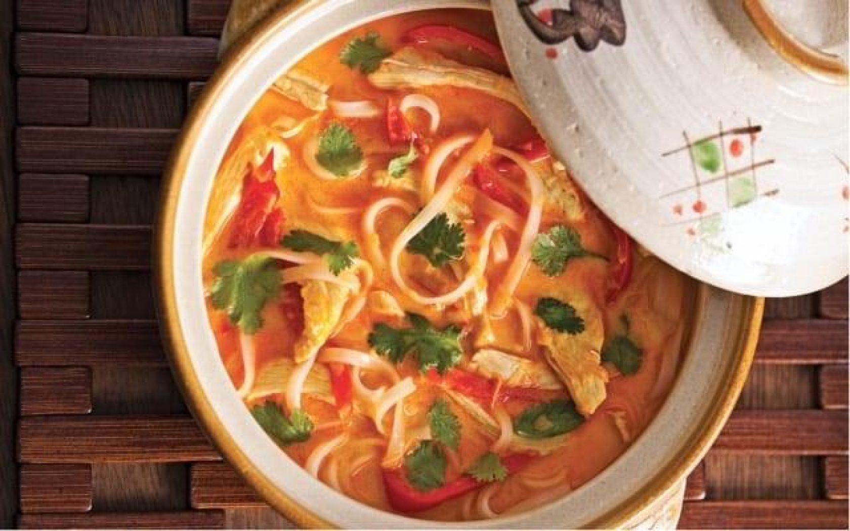 Spicy chicken soup with coconut milk